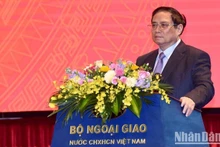 El primer ministro de Vietnam, Pham Minh Chinh, habla en el evento. (Fotografía: Nhan Dan)