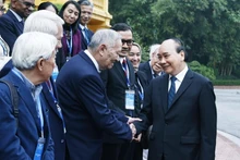 El presidente Nguyen Xuan Phuc y delegados (Fotografía: VNA)