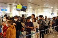 En el aeropuerto internacional Tan Son Nhat, en Ciudad Ho Chi Minh (Foto: VNA)