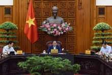 [Foto] Premier vietnamita preside reunión sobre control de inflación