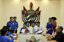 En la firma del memorando de entendimiento de cooperación periodo 2023-2027 entre jóvenes de Vietnam y Cuba (Fotografía: VNA)