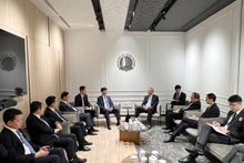 En la reunión entre Nguyen Duy Ngoc, viceministro de Seguridad Pública de Vietnam y Teo Chee Hean, ministro principal y ministro coordinador de Seguridad Nacional de Singapur (Foto: cand.com.vn)