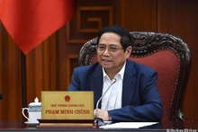 El primer ministro vietnamita, Pham Minh Chinh, habla en el evento. 