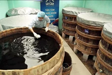 Cada tanque de madera para la fermentación contiene decenas de toneladas de pescados. (Foto de archivo)