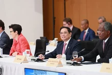El primer ministro Pham Minh Chinh asiste a la cita.