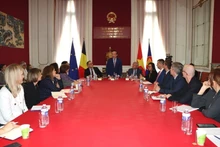 Durante la reunión (Foto: VNA)