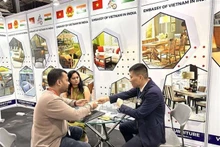 En el stand de Vietnam en la exposición (Foto: VNA)