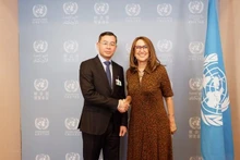 El auditor general estatal de Vietnam, Ngo Van Tuan, y la secretaria general de la UNCTAD, Rebeca Grynspan. (Fotografía: VNA)