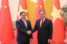 El primer ministro de Vietnam, Pham Minh Chinh, y su homólogo chino, Li Qiang (Fotografía: VGP)