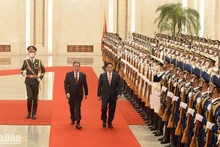 El primer ministro de Vietnam Pham Minh Chinh y su homólogo de China, Li Qiang.