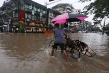 Escena de inundación después de fuertes lluvias en Yangon, Myanmar el 31 de julio pasado (Fotografía: Xinhua/VNA)