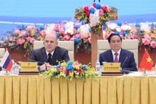El primer ministro vietnamita, Pham Minh Chinh, y su homólogo ruso, Mikhail Mishustin, copresidieron hoy aquí el Diálogo Empresarial de Alto Nivel entre ambos países. (Foto: VPG)