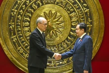 El presidente de la Asamblea Nacional de Vietnam, Tran Thanh Man (derecha) y el presidente del Tribunal Popular Supremo de China, Zhang Jun. (Foto: Nhan Dan)