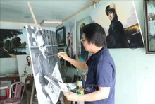 Tran Hoa Binh, pintor católico nacido en en la provincia norteña de Ninh Binh, ha dedicado más de 50 años al arte del retrato hiperrealista. (Foto: VNA)