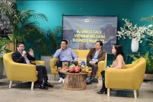 Delegados comparten sus experiencias en el foro (Foto: VNA)