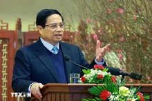 El primer ministro de Vietnam, Pham Minh Chinh, envió sus felicitaciones de año nuevo 2025 al sector bancario. (Foto: VNA)