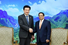 El primer ministro Pham Minh Chinh recibe al ministro de Defensa japonés, Kihara Minoru. (Foto: Nhan Dan)