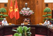 [Foto] Premier vietnamita preside reunión sobre proyecto de resolución de Asamblea Nacional sobre Centro Financiero Internacional 
