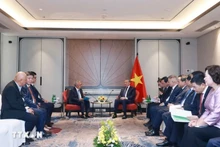 El secretario general del Partido Comunista de Vietnam, To Lam, y el director general del Grupo Ciputra, Budiarsa Sastrawinata. (Foto: VNA)
