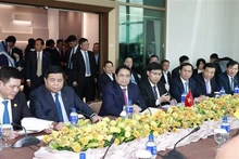 El primer ministro de Vietnam, Pham Minh Chinh, en el coloquio. (Foto: VNA)