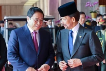 El primer ministro de Vietnam, Pham Minh Chinh, y el Sultán Hassanal Bolkiah de Brunei. (Fotografía: VGP)