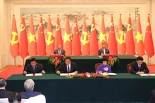Vietnam y China firman 14 documentos de cooperación (Parte 2)