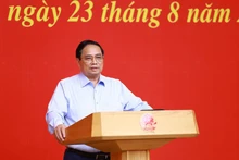 El primer ministro Pham Minh Chinh preside la reunión (Foto: VNA)