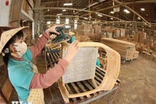 En una empresa de procesamiento de madera. (Foto: VNA)