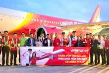 La ceremonia para dar la bienvenida a los nuevos aviones (Foto: VNA)