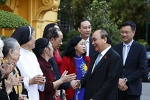 Presidente vietnamita alaba ejemplares con acciones bondadosas (Fotografía: Nhan Dan)