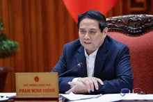 El primer ministro Pham Minh Chinh habla en la reunión. (Foto: VGP)