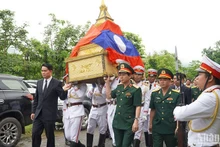 La repatriación de los restos de soldados y expertos vietnamitas caídos en Laos (Foto: Nhan Dan)