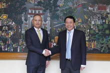 El teniente general Le Quoc Hung, viceministro vietnamita de Seguridad Pública, y el general Roy Inkapairoj, subcomandante en jefe de la Policía Real de Tailandia. (Foto: cand.com.vn)