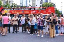 Turistas extranjeros en Ciudad Ho Chi Minh (Foto:thanhnien.vn)