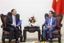El viceprimer ministro Tran Luu Quang y el presidente de la Agencia de Cooperación Internacional de Corea del Sur (KOICA), Chang Won-sam. Foto de : VNA