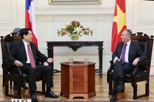 El presidente de Vietnam, Luong Cuong, y el titular del Senado de Chile, José García Ruminot.