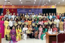 Participantes en el evento (Foto: baoquocte.vn)