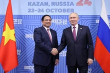 El primer ministro de Vietnam, Pham Minh Chinh, y el presidente de Rusia, Vladimir Putin. (Fotografía: VNA)