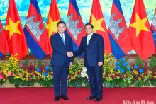 Minh Chinh y Hun Manet.