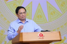 El primer ministro de Vietnam, Pham Minh Chinh, en la sesión de trabajo. (Fotografía: VNA)