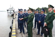 Guardias costeras de ambos países (Foto: VNA)