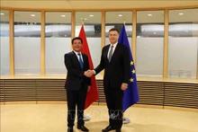 Nguyen Hong Dien, ministro vietnamita de Industria y Comercio y Valdis Dombrovskis, vicepresidente ejecutivo de la Comisión Europea y comisario de Comercio de la Unión Europea. (Fotografía: VNA)