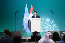 El primer ministro de Vietnam, Pham Minh Chinh, interviene en la cita (Fotografía: VNA)