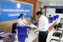 El "gobierno amigable" en el Comité Popular del distrito de Tran Phu de la provincia de Bac Giang. (Fotografía: VNA)