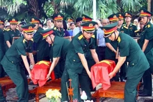 Los restos de los mártires son enterrados en el cementerio de los mártires de Ba Doc en el distrito de Bo Trach, provincia central de Quang Binh. (Fotografía: VNA)