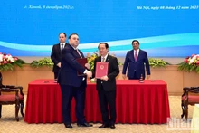Ceremonia de adjudicación del acuerdo de cooperación para la difusión oficial de las normas nacionales vietnamitas en el territorio de Bielorrusia.