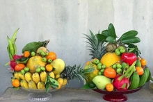 La bandeja de cinco frutas, indispensable de familias vietnamitas durante el Tet. (Fotografía: suckhoedoisong.vn)