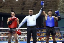Nguyen Tran Duy Nhat, el campeón mundial de Muay Thai, ahora asistente del entrenador del equipo vietnamita Kum Khmer en los SEA Games 32. (Fotografía: VNA)