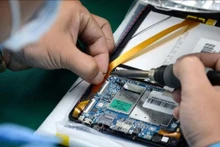 Foto ilustrativa: La producción de tabletas "hechas en Da Nang" tiene una tasa de localización de casi el 60% en la fábrica Trung Nam EMS (Parque Centralizado de Tecnología de la Información en la ciudad de Da Nang). (Fuente: VNA)