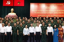 El presidente de Vietnam, Vo Van Thuong, y los delegados a la conferencia. (Foto: VNA)